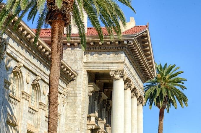 Palm trees frame the facade of the Administration Building.